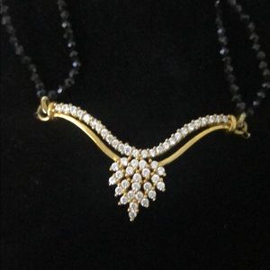 22 karat real gold necklace with black crystals